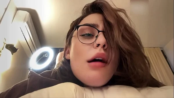 Hot brunette with glasses and big ass gets a luscious facial