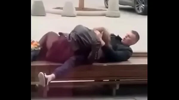 Stupid blonde gives blowjob in public