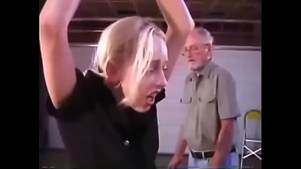 Caning a young slender blonde