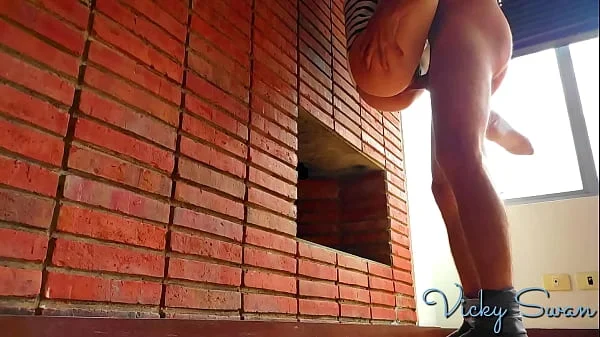 He fucks and cums inside his girlfriend in pajamas holding her passionately against wall